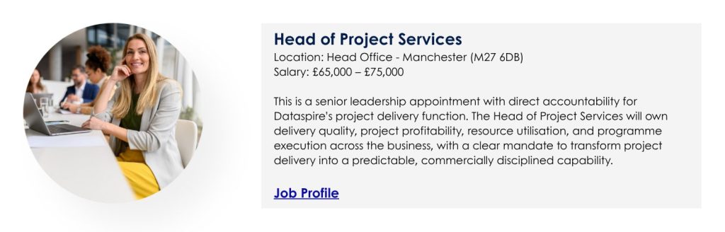 An ad for Head of Project Services with a woman sitting at her desk with a laptop in an office. 
